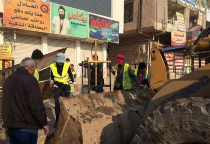 عمليات وامانة بغداد تباشران بفتح الشوارع المغلقة في مدينة الصدر
