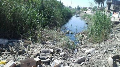 المباشرة بفتح الاختناقات المائية لقناة الحلة الرئيسية