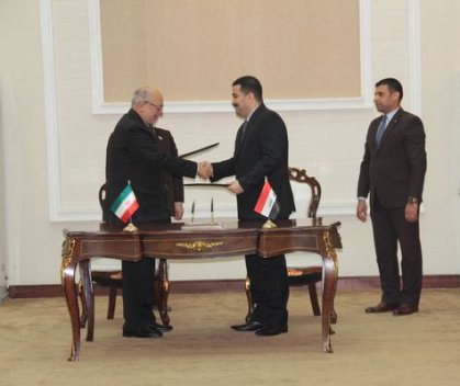 العراق وايران يوقعان بروتوكولا للتعاون التجاري يفتح آفاقا اوسع بين البلدين