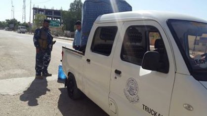 العتبة العلوية توزع المياه النقية الباردة على المواطنين في النجف الأشرف