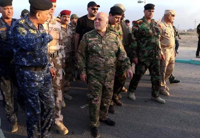 العبادي: جئنا لتحرير الموصل وسنقطع رأس داعش