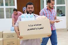 توزيع أكثر من 8 آلاف مساعدة عينية للنازحين في مخيمات بغداد