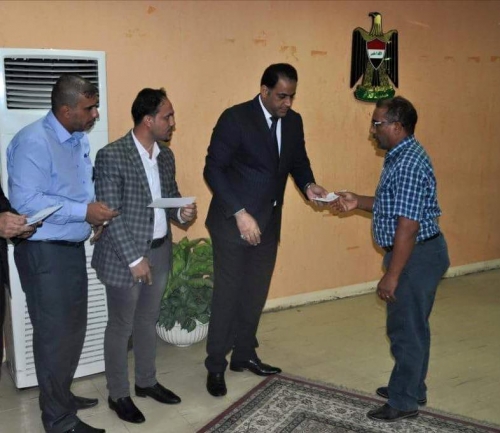 توزيع الدفعة السادسة من مبالغ التعويضات على مستحقي اضرار الممتلكات في بغداد